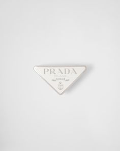 White Metal Hair Clip | PRADA Metal Hair Clip, Metal Hair Clips, Metal Hair, Triangle Logo, Metallic Hair, Metal Logo, Metallic Logo, Clothes Accessories, White Metal