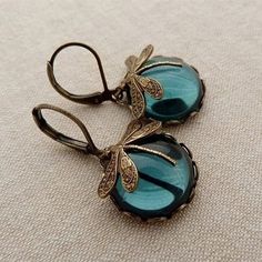 Gender:Women's; Quantity:2pcs; Theme:Dragonfly; Shape:Oval; Style:Vintage,Cool; Width of Earrings:-; Jewelry Type:Earrings; Occasion:Wedding,Party; Material:Chrome; Length of Earrings:-; Design:Vintage Style; Features:Cool,Lovely; Front page:WE; Listing Date:06/16/2023 Pretty Dragonfly, Club Earrings, Glass Background, Moonstone Drop Earrings, Vintage Dragonfly, Glamour Vintage, Vintage Drop Earrings, Wedding Charm, Dragonfly Charm