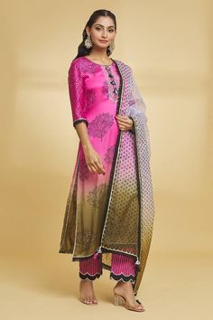 Pink ombre kurta with floral motif, tassels and lace details. Paired with a pant and dupatta. - Aza Fashions Festive Straight Kurta Sharara With Tassels, Festive Sharara With Tassels And Straight Kurta, Diwali Sharara With Tassels And Straight Kurta, Traditional Tassel Palazzo Set For Wedding, Multicolor Tassel Sets For Diwali, Designer Salwar Kameez With Tassels For Navratri, Bollywood Style Salwar Kameez With Tassels For Navratri, Multicolor Kurta With Tassels For Festivals, Festive Designer Salwar Kameez With Tassels