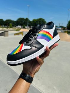 Introducing our Rainbow LGBT Pride Low Top Black Leather Sneakers, inspired by the iconic NIKE Dunk style and designed for everyone to wear proudly. Crafted with premium black leather and featuring vibrant rainbow accents, these sneakers celebrate diversity and inclusivity in style. With their low-top design and unisex appeal, these sneakers offer both fashion and comfort for any occasion. The durable construction ensures long-lasting wear, while the cushioned insole provides all-day comfort. Wh Multicolor Gum Sole Skate Shoes For Streetwear, Multicolor Low-top Custom Sneakers For Skateboarding, Trendy Rainbow Low-top Sneakers, Trendy Black Low-top Custom Sneakers, Sporty Rainbow Sneakers With Branded Insole, Rainbow Custom Sneakers For Streetwear, Rainbow High-top Sneakers With Rubber Sole, Trendy Black Mid-top Custom Sneakers, Urban Multicolor Leather Sneakers