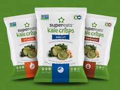 three bags of kale crispes on a green background