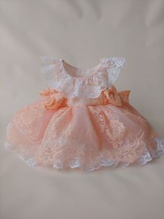 Lase blessing dress baby . This pink or white lace dress truly is rustic simplicity at its finest! Cascades of lace ruffle top and tulle skirt with stunning lace trim (one piece). Perfect to wear as a flower girl dress in a rustic country wedding, birthdays, Christening, baptism, special occasions and more. Spring Princess Lace Dress, Spring Princess Style Lace Dress, Princess Style Lace Dress For Spring, Lace Princess Dress With Ruffles For First Communion, Spring Princess Dress With Lace Sleeves, Pink Lace Dress For First Communion, Princess Style Lace Dresses With Lace Trim, Pink Lace Dress With Lace Bodice, Lace Baptism Dress With Lace Trim For Party