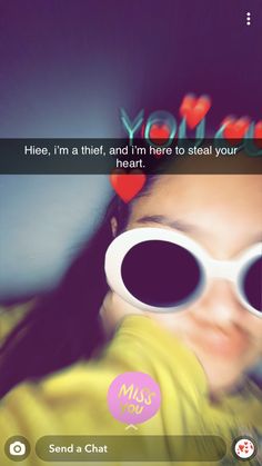 a girl with heart shaped sunglasses on her face and the caption says, you're here, i'm not afraid to steal your heart