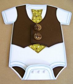 a paper cut out of a baby's bodysuit with buttons on the chest