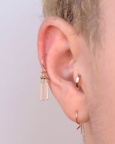 Short bars of gold dancing below your earlobe. Sold as single earrings in solid 14k yellow gold. 20ga wire 26mm total length No earring back! Single Earring, Earring Backs, Dancing, Yellow Gold, Bar, Yellow, Gold