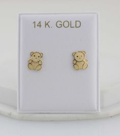 This Cute and Precious dainty Teddy Bear Stud Post Earrings are made from high-quality Solid 14k Gold They are a perfect gift for that special little one and excellent for everyday wear. Item Specifications: Model # BE-1305 Metal Type: Solid 14K Gold Metal Stamp: 14K Shape Teddy Bear Fastening: Screw Back Size: 1/4 x 1/4 inch (approx 6 x 6 mm) Earrings Puff Pad size: 1 3/8 inches x 1 1/8 inch (35mm x 28mm) The screw backs are really good for kids and adults because its hard to lose the earrings 14k Yellow Gold Earrings For Birthday, Gold Teddy Bear, Screw Back Earrings, Metal Stamping, Post Earrings, Types Of Metal, Little One, Gold Metal, Solid Gold