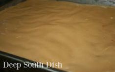 a pan filled with brown batter sitting on top of a counter