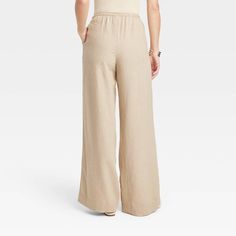 These High-Rise Wide-Leg Linen Pull-On Pants from A New Day™ make a great pick for warm-weather wear. Fashioned in comfortable wide-leg silhouette, they bring relaxed style to your look. The functional drawstring on the pull-on waist lets you get the perfect fit with every wear, and the functional pockets provide space for on-the-go essentials. A New Day™: Style that goes wherever you do. Weather Wear, Womens Clothing Sizes, Pull On Pants, Relaxed Style, Body Measurements, A New Day, Warm Weather, New Day, Jumpsuits For Women