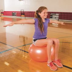 Enjoy a versatile workout with these lightweight exercise and therapy balls, perfect for various activities like jumping, balancing, and exercising. Crafted as one seamless piece with a roto-molded design, these balls offer enhanced durability with a thick vinyl skin. The tacky, non-slip surface ensures a secure grip during workouts, making them easy to handle. Each ball is designed to support up to 200 lbs, providing stability for a range of exercises. With colors that may vary, these balls off Exercise Therapy, Therapy Ball, Clear Tote Bags, Exercise Ball, Active Play, Sports Balls, Physical Education, Play Activities, Outdoor Toys