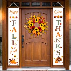 a wooden door with a happy thanksgiving wreath on it