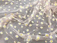 white and yellow daisies on sheer organ - mesh fabric, by the yard or yard