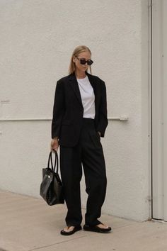 Intended to be worn everyday, the Bobbi Blazer is a minimalist wardrobe essential. It's relaxed but tailored silhouette produces a soft structure that not only flatters the body, but allows for additional layering underneath. The Bobbi Trousers feature a high-waist, straight leg silhouette with pleats at the waistband. The relaxed leg allows for additional comfort in the movement of everyday life. Minimalist Wardrobe Essentials, Minimalist Wardrobe, Oversized Blazer, The Body, Flap Pocket, Everyday Life, Wardrobe Essentials, Layering, Straight Leg