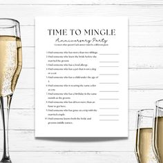 two glasses of champagne next to a card that says time to mingle with the words,