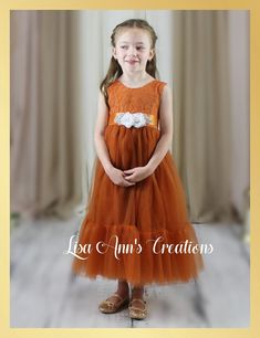 This stunning Burnt Orange Mermaid Style Junior Bridesmaid Dress, complete with a sleeveless design, is perfect for your little angel to make her presence felt on your special day. Crafted with attention to detail, this dress is not just a dress but a keepsake that will make memories last a lifetime. Pin it now if you are planning on making your little one the most stylish flower girl on the block! Sleeveless Lace Patchwork Dress For Dress-up, Sleeveless Princess Dress With Lace Bodice And Tulle, Sleeveless Tulle Princess Dress With Lace Bodice, Sleeveless Bridesmaid Princess Dress With Lace Trim, Sleeveless Pageant Dress With Sheer Bodice, Sleeveless Lace Princess Dress For Bridesmaid, Fitted Tulle Sleeveless Dress For Dress-up, Sleeveless Lace Princess Bridesmaid Dress, Sleeveless Lace Bridesmaid Princess Dress