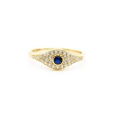 Luck never looked so good. This Evil Eye ring is a symbol of luck and protection, and needs to be featured in your daily ring stack! 14k gold plated sterling silver Clear crystals with a sapphire center stone Gold Sapphire Crystal Ring, Spiritual Gold Birthstone Promise Ring, Gold Sapphire Jewelry With Center Stone, Gold Sapphire Spiritual Promise Ring, Spiritual Gold Sapphire Promise Ring, Gold Sapphire Jewelry For Promise, Gold Sterling Silver Sapphire Promise Ring, Gold Sapphire Ring In Sterling Silver For Promise, Gold Evil Eye Promise Ring