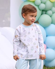 Get ready to party in style with our Party Animals White with Blue Shirt! Perfect for the birthday boy, this cute printed shirt features adorable zoo animals celebrating and a blue-trimmed round collar. Let your little boy enjoy his day in this darling birthday shirt! Casual Bedtime Tops With Character Print, Long Sleeve Cartoon Print Bedtime Tops, Blue Cartoon Print Long Sleeve Shirt, Blue Long Sleeve Shirt With Cartoon Print, Cute Shirt With Character Print For Playtime, Cute Character Print Shirt For Playtime, Casual Blue Birthday Tops, Fun Long Sleeve Tops For Birthday, Fun Cotton Tops For Bedtime