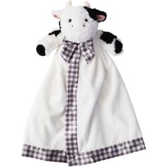 a black and white stuffed animal wearing a dress