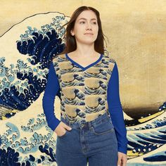 "This amazing dark blue Women's Long Sleeve V-neck Tee with a pattern of \"The Great Wave off Kanagawa\". Cool Vintage Japanese Art. This Tee is perfect for you!  Take your style to the next level and make a statement with this classy Shirt.  Perfect for gift giving, it's an unforgettable way to show your love and appreciation.  If you need something to be customized or you have any question regards the items I sell, don't hesitate to get in touch! Thank you for shopping at DIgital Art by Jean ! Blue Long Sleeve Printed T-shirt, Cotton V-neck Top With All Over Print, Blue V-neck T-shirt With Graphic Print, Blue Long Sleeve Shirt With All Over Print, Blue Long Sleeve Top With All Over Print, Artistic Blue Crew Neck Tops, Blue Long Sleeve Top With Sublimation Print, Fitted Long Sleeve Shirt With Custom Print, Artistic Long Sleeve Shirt With Graphic Print