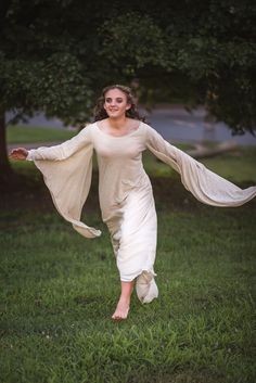 "This is a really lovely Medieval style dress averages 60\" long from top of shoulder to hem in the colors of your choice. It has long angel sleeves that can be tied up or left long, and a fitted inner sleeve. It is fully lined and can be one of the most comfortable gowns you'll ever owned. Cinch it in at the waist with a belt or corset. All purchases are nonrefundable and colors may vary based on what can be found. I've had people come up with some pretty outlandish requests before. For the bes Spring Medieval Fitted Dress, Bohemian Fitted Medieval Dress For Summer, Fitted Bohemian Medieval Dress For Summer, Medieval Style Dress For Summer Larp, Medieval Summer Dress For Larp, Fitted Medieval Dress For Summer, Medieval Style Dress For Larp In Summer, Fitted Medieval Summer Dress, Fitted Medieval Style Summer Dress