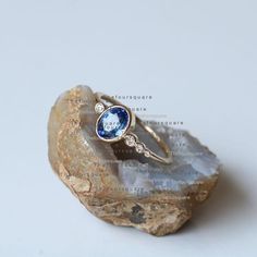 Delicate 14K Solid Gold SI diamond Ring, Bezel setting Ring, Dainty  Ring, Natural Diamond Delicate Ring, Product info:14k solid goldWhite Diamond: SI- I ClarityDiamond: 0.04ct , NaturalGemstone: sapphire, naturalRing size 7Item will be resized and shipped within 10 days.ITEM Will BE SHIPPED : India Speed PostTo get the item in 4-5 days, we can also ship it thru DHL express, please contact us before.Please select your size at the drop down menu.Thanks!♥Shipping Policy,:Processing time is 2-3 wee Blue Sapphire Ring With Bezel Setting, Sapphire Bezel-set Oval Cabochon Ring, Oval Cabochon Sapphire Ring With Bezel Setting, Oval Sapphire Ring With Gemstone Accents, Oval Cabochon Bezel Set Sapphire Ring For Anniversary, Oval Tanzanite Birthstone Ring, Oval Cabochon Sapphire Ring With Bezel Setting For Anniversary, Oval Diamond Birthstone Ring With Bezel Setting, Anniversary Oval Cabochon Sapphire Ring With Bezel Setting