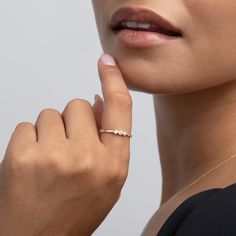 Let yourself bask in the appeal of this beautiful 14K Gold Three Stone Ring from our range of chic jewelry. This dainty ring has been carefully crafted with three gold rings set in 925 Sterling Silver plated with 14K Gold to form a fashion must-have item. This piece of Handmade Jewelry is sure to make you stand out with its trendy and classic design, available in colors like gold, silver and rose gold, allowing you to show off your personal style perfectly. Perfect for special occasions or as a Fine Jewelry Stackable Cluster Ring, Stackable Cluster Ring For Promise, Stackable Cluster Promise Ring, 14k Gold Fine Jewelry Cluster Ring, Elegant Bypass Ring With Prong Setting For Gift, Fine Jewelry Bypass Ring As Gift, Fine Jewelry Bypass Ring With Round Band As Gift, 14k Gold Diamond Cut Bypass Ring As Gift, Modern 14k Gold Cluster Ring For Gift