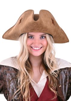 a woman wearing a pirate hat with long blonde hair