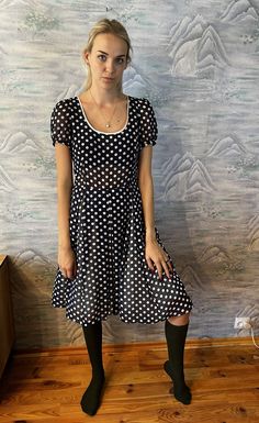 "Vintage Summer Dress Dark Blue Dots Dress Short Sleeve  Dress Hipster Festival Dress Size Medium 90's Dress Grandma dress Estimated size: M Measurements: (lying flat) Length: 41\" / 104 cm Pit to pit: 18\" / 46 cm Waist: 14,5\" / 37 cm Shoulder: 15.5\" / 39 cm Sleeve: 8\" / 20 cm Models size:  height: 71,6 \"/ 182 cm Bust: 37.7\" / 96 cm  Waist: 29.1\" / 74 cm Hips: 32.2 / 82 cm Please check measurements to insure a proper fit. Remember to allow yourself some extra room for movement. You can co Vintage Knee-length Polka Dot Dress, Vintage Polka Dot Knee-length Dress, Vintage Polka Dot Mini Dress, Vintage Mini Dress In Polka Dot, Fitted Polka Dot Midi Mini Dress, Fitted Casual Vintage Mini Dress, Vintage Polka Dot Dress With Short Sleeves For Summer, Grandma Dress, Vintage Summer Dress