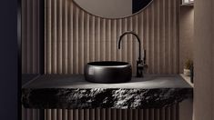 a bathroom sink sitting under a round mirror next to a wall mounted faucet