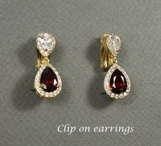 "Clip on burgundy bridal earrings set, Clip on post drop earrings, Bridal party jewelry set, Mothers gifts This CLIP ON set top clear AAA cubic zirconia posts matched with bottom tear drop CZ burgundy pendants, and matching necklace and bracelet set. They are in high quality Rose gold, Gold and White gold (silver colored) plated settings, nickel, lead, and cadmium free, and are tarnish resistant. Different stone colors available (see color chart in last picture), please leave a note for color nu Formal Drop Earrings For Valentine's Day, Red Clip-on Earrings For Wedding, Elegant Dangle Jewelry For Valentine's Day, Elegant Valentine's Day Dangle Jewelry, Elegant Burgundy Dangle Jewelry, Party Clip-on Drop Jewelry, Anniversary Clip-on Cubic Zirconia Jewelry, Valentine's Day Gold Clip-on Jewelry, Red Hypoallergenic Jewelry For Party