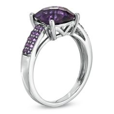 Wow the February-born birthday girl with a dazzling ring that's just her style! Fashioned in sleek sterling silver, the focus of this ring is the 9.0mm cushion-cut purple amethyst center stone that draws the eye. The band is lined with a double row of additional amethysts, adding an additional pop of color. Polished to a brilliant shine, this ring is certain to captivate and delight her. Custom made to fit her ring size. Sterling silver rings cannot be resized after purchase. Elegant Asscher Cut Purple Ring, Elegant Purple Asscher-cut Ring, Elegant Purple Asscher Cut Ring, Elegant Cushion Cut Amethyst Ring, Elegant Purple Cushion Cut Amethyst Ring, Classic Cushion Cut Purple Jewelry, Purple Cushion Cut Fine Jewelry, Classic Purple Cushion Cut Jewelry, Modern Purple Amethyst Ring With Accent Stones