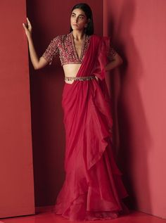 This set features a deep fuschia raw silk jeweled embroidered blouse and chiffon-organza draped ruffle saree paired with an embroidered belt. Color: Pink Fabric: Chiffon; Organza; Raw silk Care: Dr... Deep Fuschia, Ruffled Saree, Ethnic Saree, Ridhi Mehra, Ruffle Saree, Embroidered Belt, Saree Designs Party Wear, Traditional Indian Outfits, Saree Trends