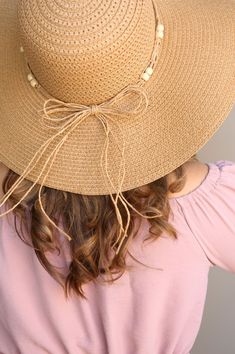 Block the rays in the most stylish of ways! Our BOHEMIAN hat comes in a natural tan woven texture. A straw beaded band tops off the look. Decorate your Summer outfits with a lightweight touch! Measurements: 4” Brim, 3.5” Crown Depth, 7.5” Head Diameter Material: 100% paper Casual Beaded Fedora Sun Hat, Beige Woven Hat Bands For Summer, Beaded Hat Band For Summer Vacation, Casual Braided Hat Band For Vacation, Beaded Hat Bands For Summer Vacation, Casual Braided Hat Bands For Vacation, Summer Woven Beige Hat Bands, Summer Beige Woven Hat Bands, Summer Vacation Beaded Hat Bands