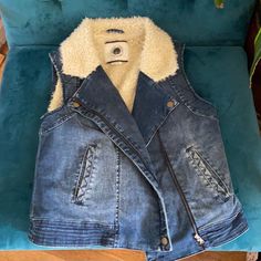 Daughters Of The Liberation - Anthropologie - Sherpa Lined Denim Vest. Zip Front With Pockets On Both Sides. Size Small - New Never Worn - Sherpa Lined Denim Vest, Winter Denim Vest In Medium Wash, Fitted Denim Vest For Winter, Trendy Denim Blue Winter Vest, Trendy Dark Wash Denim Vest For Winter, Fitted Denim Blue Winter Vest, Fitted Denim Blue Vest For Winter, Anthropologie Sherpa, Sherpa Lined Jacket