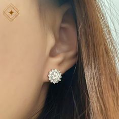 "A playful and elegant choice of stud earrings in sunflower shape. With 0.5ct/1ct moissanite center stone surrounded by smaller stones. You are the most shinning star when wearing them! Just feel the sparkle from it. Anniversary gift for her, bridal stud earrings, round moissanite stud earrings, wedding stud earrings, gift for mum, Christmas gift Sold in pairs. For 14k and 18k gold versions , it is possible to order one only. Please contact us for a customized listing. The first model picture is White Gold Flower Earrings For Anniversary With Prong Setting, Anniversary White Gold Flower Earrings With Prong Setting, White Gold Flower Earrings With Brilliant Cut, White Gold Flower Earrings For Anniversary, Diamond White Round Flower Earrings With Prong Setting, Diamond White Flower Earrings With Cubic Zirconia, Diamond White Flower Earrings With Prong Setting, White Gold Flower Earrings With Prong Setting, Diamond Flower Earrings With Prong Setting As Gift