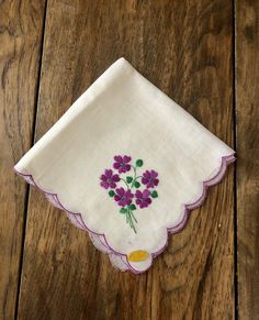 "This darling handkerchief features charming raised floral detail and a scalloped edge. It is in very good vintage condition with original sticker that says Made in Switzerland/all cotton. Use it for a personal accessory or your celebration. Very pretty... Approx. measurements: 10.5\" square overall See more hankies in our shop: https://www.etsy.com/shop/TwoBeContinued?ref=seller-platform-mcnav&section_id=24425115 Message with questions, we do not accept returns." Vintage Hankie Pillows, Elegant High-end Handkerchiefs For Formal Occasions, Cheap Decorative Handkerchiefs For Gifts, Luxury Elegant Formal Handkerchiefs, Cheap Classic Handkerchiefs For Business, Cheap Cotton Handkerchiefs For Gifts, Handkerchief Embroidery Broiderie Stitch, Displaying Handkerchiefs At Wedding, Handkerchief For Women