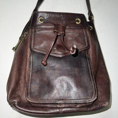 Large Fossil 100% Genuine Leather Backpack / Backpack Purse. Many Brass Details Inside And Out, And Multiple Compartments, Zippers And A Drawstring For Extra Secure Closure. Vintage Knapsack Drawstring Bucket Bag. Beautiful Rich Mahogany Brown Color, Extremely Thick And Durable Leather Material. Full Grain Cowhide. Roomy Inside And Easy Access Drawstring. Drawstring Bucket Purse, Leather Backpack Purse Fossil, Genuine Leather Handbags Vintage, Fossil Bags, Drawstring Bucket Bag, Backpack Purse, Leather Material, Brown Color, Leather Backpack