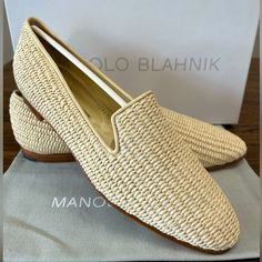 Coveted And Timeless New Manolo Blahnik Woven Raffia Loafers. These Are Size 38.5/8.5 In Natural Beige With A Wonderful Sheen. The Construction Is Impeccable With Brass Heel Tacks. These Have Never Been Worn And Are In Pristine Condition. They Come With The Manolo Blahnik Box And Dustbag And All Packaging. I Have The Same Style In Navy Blue In My Closet! Check Out My Closet For Other Brand New Manolo Blahniks And Jimmy Choos! Please Ask Any Questions Before Buying, And Be Sure To Review All Phot Elegant Spring Loafers With Woven Sole, Chic Loafers With Woven Sole And Flat Heel, Chic Loafers With Woven Sole, Elegant Slip-on Loafers With Woven Sole, Spring Formal Loafers With Woven Sole, Elegant Woven Leather Loafers, Elegant Flats With Woven Sole And Almond Toe, Chic Beige Loafers With Woven Sole, Elegant Almond Toe Flats With Woven Sole