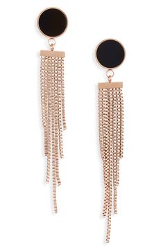 Long chain fringe dangles from Art Deco–inspired earrings destined to make a glamorous statement. 2 1/2" drop; 1/4" width Post back Stainless steel/goldtone plate/enamel Imported Elegant Fringe Metal Chandelier Earrings, Elegant Metal Fringe Jewelry, Chic Metal Dangle Tassel Earrings, Chic Metal Tassel Dangle Earrings, Metal Fringe Jewelry For Evening, Trendy Evening Dangle Chandelier Earrings, Evening Metal Fringe Jewelry, Adjustable Chain Dangle Earrings For Evening, Evening Dangle Earrings With Adjustable Chain