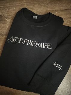 TXT ACT:PROMISE embroiderd on a super soft crewneck sweatshirt. With TXT logo on right sleeve. Get this now before the 2024 World Tour! Streetwear Crew Sweatshirt With Embroidered Graphics, Black T-shirt With Embroidered Logo For Fall, Black Embroidered Logo T-shirt For Fall, Txt Embroidery, Streetwear Crew T-shirt With Embroidered Text, Streetwear Embroidered Text Crew T-shirt, Streetwear Embroidered Text T-shirt Crew Neck, Black Crew Sweatshirt With Embroidered Text, Black Embroidered Text Sweatshirt Crew Neck