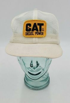 This is an excellent pre-owned vintage CAT Diesel Power White Trucker Hat Snapback.  It's in great condition with minor signs of use and ready for adventure! The beim is floppy and has lost its full structure. Shipped with USPS First Class. Please let me know if you have any questions. Thank you! White Trucker Hat, Cap Style, Hats Snapback, Vintage Cat, First Class, Trucker Cap, Let Me Know, Trucker Hat, Captain Hat