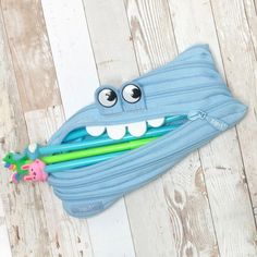 Made using one long zipper, our Monster Pencil Case is brimming with character. Lively eyes on the outside of the case, are complemented by cute rubber teeth just inside the extra wide zippered opening. Your child will love the fun design and you'll be thrilled with the outstanding quality, construction and storage space. Blue Pencil Case With Zipper For School, Blue Pencil Case With Zipper Pocket For School, Cute Portable Blue Pencil Case, Cute Blue Portable Pencil Case, Blue Pencil Case With Zipper Closure, Cute Blue Pencil Case For Everyday Use, Cute Blue Pencil Case With Pen Holders, Blue Monster, Big Personality