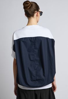 One size, fits XS-LColor: BlueWhite and Light Blue Striped FrontNavy Blue BackWhite Contrast PanelsLonger in back80% Cotton 20% NylonDry Clean or Hand Wash By The NKC StoreProduct Measurements:Bust: 147.32cm / 58inLength: 53.34cm / 21inSleeve Length: 22.86cm / 9inModel is 175cm / 5'9" wearing Size O/S Casual Blue Nylon Tops, Black Tank Dress, Black Aviators, Blue Back, Neon Purple, Boyfriend Tee, Engineered Garments, Pullover Sweatshirt, Blue Stripes