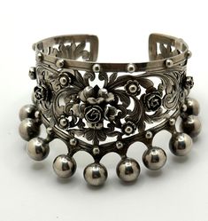 Extremely rare vintage signed Peruzzi 800 silver Florence cuff with rose and etruscan ball motif. Excellent condition. Elegant Ceremonial Sterling Silver Bracelet With Oxidized Finish, Elegant Antique Silver Cuff Bracelet With Oxidized Finish, Elegant Oxidized Antique Silver Sterling Bracelet, Ceremonial Oxidized Finish Cuff Bracelet, Elegant Ceremonial Cuff Bracelet With Oxidized Finish, Ceremonial Oxidized Finish Elegant Cuff Bracelet, Elegant Antique Silver Cuff Bracelet, Elegant Ceremonial Oxidized Cuff Bracelet, Elegant Oxidized Finish Cuff Bracelet For Formal Occasions