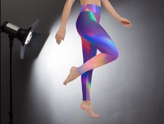 Add a pop of color to your workouts with these Electric Flow Yoga Leggings from GlowVibe. Designed for athletes, yoga enthusiasts, and eco-conscious shoppers, these high waisted leggings feature a vibrant, gradient design that stands out. Made from 82% polyester and 18% spandex, the 4 way stretch peach skin fabric feels soft and luxurious, making it perfect for any physical activity. Key Features: Moisture Wicking: Absorbs moisture and dries quickly, keeping you comfortable during intense sessions Eco Friendly Fabric: Perfect for those who prioritize sustainability in their activewear Tear Away Care Label: Removable for added comfort and a smooth fit Full Length: Ends right above the ankle, providing full coverage and a sleek look High Waisted Fit: Ensures a flattering fit that stays in pl Poses Gym, Gym Dance, Rainbow Leggings, Flow Yoga, Gradient Design, Leggings Design, Eco Friendly Fabric, Yoga Flow, Outdoor Workouts