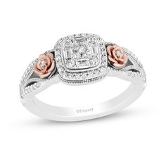 Charm and delight the room when you wear this romantic cushion-shaped multi-diamond rose ring from the Enchanted Disney Fine Jewelry Collection inspired by Belle. Crafted in sterling silver Round and baguette-cut diamonds sparkle in a cushion-shaped composite - all wrapped in a diamond halo. Diamond-touched 10K rose gold flower details flank the center. Starting along the shank, looped ribbons of intricate milgrain detailing wrap the blooms and the centerpiece. Diamond-lined ribbons and crown in Diamond Symbol, Disney Engagement Rings, Zales Jewelry, Disney Fine Jewelry, Enchanted Disney Fine Jewelry, Frame Ring, Silver Flower Ring, Silver Engagement Rings, Diamond Solitaire Engagement Ring