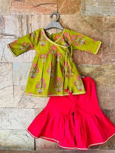 Please visit our entire shop collection on link : https://www.etsy.com/shop/EthnicPehnava Specifications: *Brand - Ethnic Pehnava *Type - Sharara *Fabric -Cotton *Sleeves - 3/4 th sleeves  *Neck - Round  *Closure - Pullover / Hooks  *Lining - Butter Crepe (Very Soft) *Salwar Length - Full Palazzo / Elastic in waistband *Occasion - Ethnic Wear/Festive wear/Party Wear/Wedding Party *Fit - Regular Items included in Package *1 Kurti, 1 Palazzo  Wash Care Instructions:  HAND WASH /GENTLE WASH ONLY. Wash dark colors separately. Green Cotton Sets With Zari Work, Green Cotton Sharara For Navratri, Green Cotton Sharara For Festivals, Pista Green Long Sleeve Cotton Anarkali Set, Pista Green Cotton Sets For Festivals, Cotton Pista Green Dress For Festivals, Pista Green Cotton Dress For Festivals, Festive Cotton Dresses For Diwali, Fitted Cotton Palazzo Set For Festive Occasions