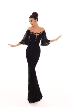 Every detail of this dress from Tarik Ediz 93671 is dripping with faultless charm! The dress is designed in combination of dramatic lacy bat sleeves and an illusion neckline. The bodice is accentuated with elegant embroidery and sparkly slip-on lace that creates a stunning look. Get noticed in this radiant look from Tarik Ediz. Black Dress Classy Elegant Long, Dress Classy Elegant, Black Dress Classy, Tarik Ediz Dresses, Dinner Gowns, Bat Sleeves, Tarik Ediz, Trumpet Dress, Affordable Prom Dresses