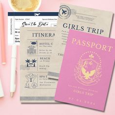 two pink passport cards next to a cup of coffee and pencils on a pink surface