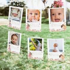 baby pictures hanging from clothes line in front of trees and grass with flowers on them