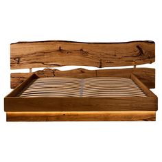 a bed made out of wood with no sheets